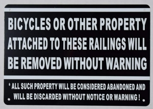 Bicycles OR Other Property Attached to These RAILINGS Will BE Removed ( Review