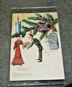 1908,ANTIQUE POSTCARD-CHRISTMAS DECORATIONS WITH ODD HALLOWEENISH DECORATIONS Review