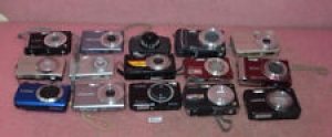 Lot of 15 Digital Cameras__Parts Only. Review