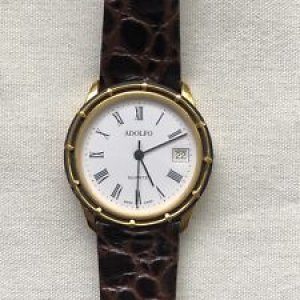 Adolfo Women’s Wristwatch Round Date Gold Brown Croc Band Roman Numerals Review