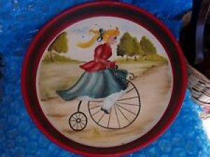Vtg 13″ Round Hand Painted Tole Pan Wall Art Girl on Bicycle Ompir or style of Review