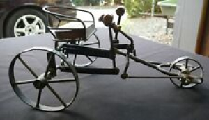Miniature antique style metal and wood push pedal tricycle toy  Review